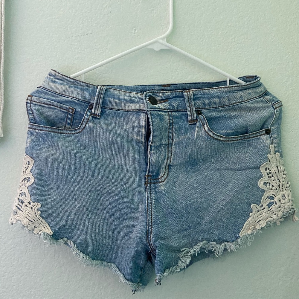 Womens Light Washed Jean Shorts With a Lace Design